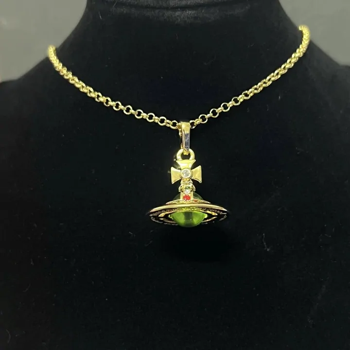 Gold UFO Pendant Necklace with Green Crystal and Cross Charm